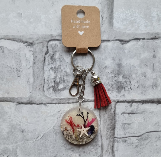 Round Beachy Resin Keyring with Starfish, Small Red Tassel and Bag Clip