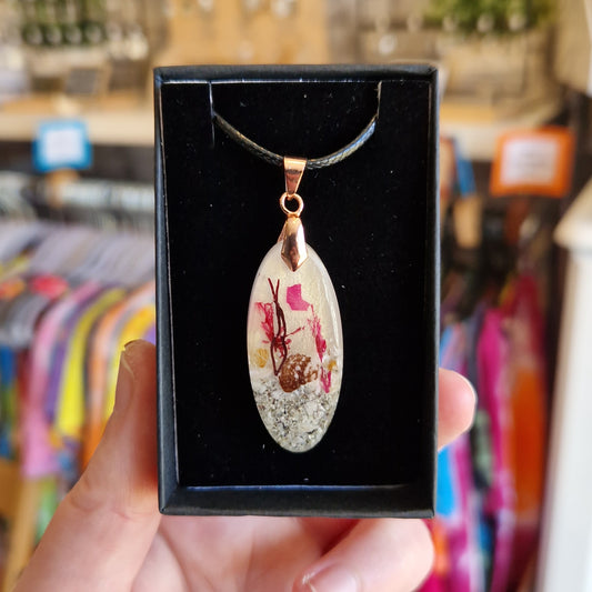 Beachy Oval Resin Necklace with Rose Gold on Black Cord