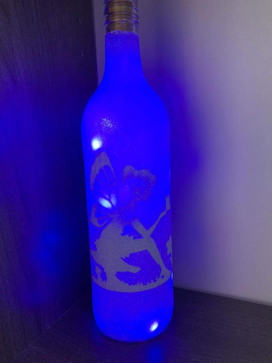 Iridescent White Glitter Fairy Silhouette Bottle